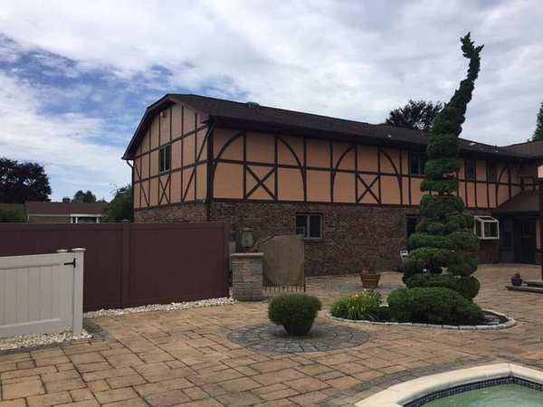 Joseph Assise III painting team at work